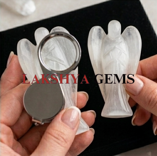 Selenite Crystal Angel from Lakshya Gems Mumbai A hand-carved natural Selenite crystal angel featuring a pearlescent white glow and polished finish.