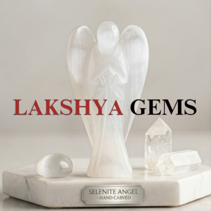 A hand-carved natural Selenite crystal angel featuring a pearlescent white glow and polished finish.