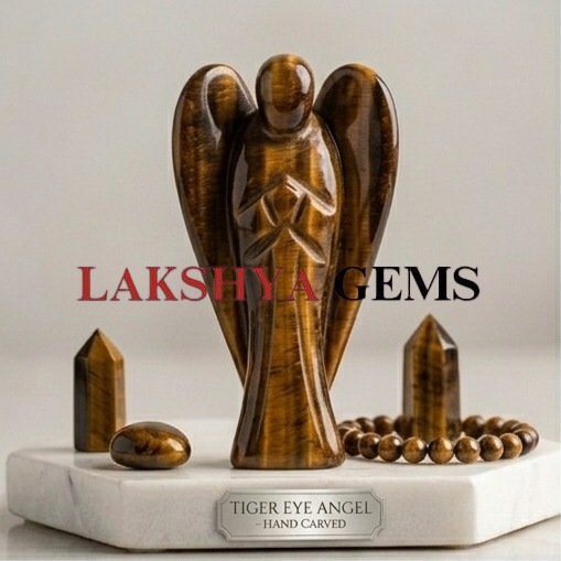 A hand-carved natural Tiger Eye crystal angel showing silky golden-brown bands and a polished finish.