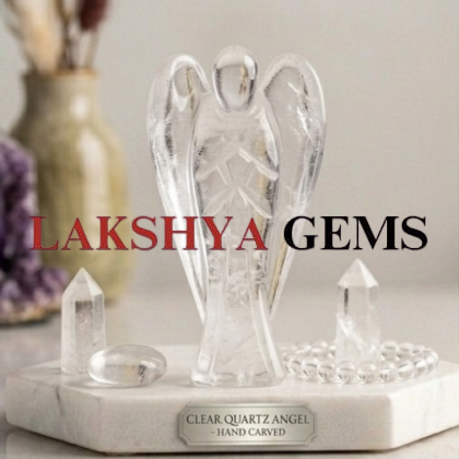A hand-carved natural Clear Quartz crystal angel featuring high transparency and a brilliant polished finish.