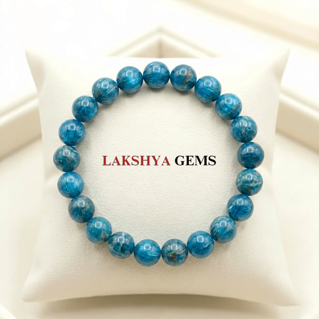 A natural Blue Apatite healing bracelet featuring round indigo-blue beads with a slight silky luster.